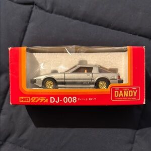 Silver and Gold Die-Cast Car Model